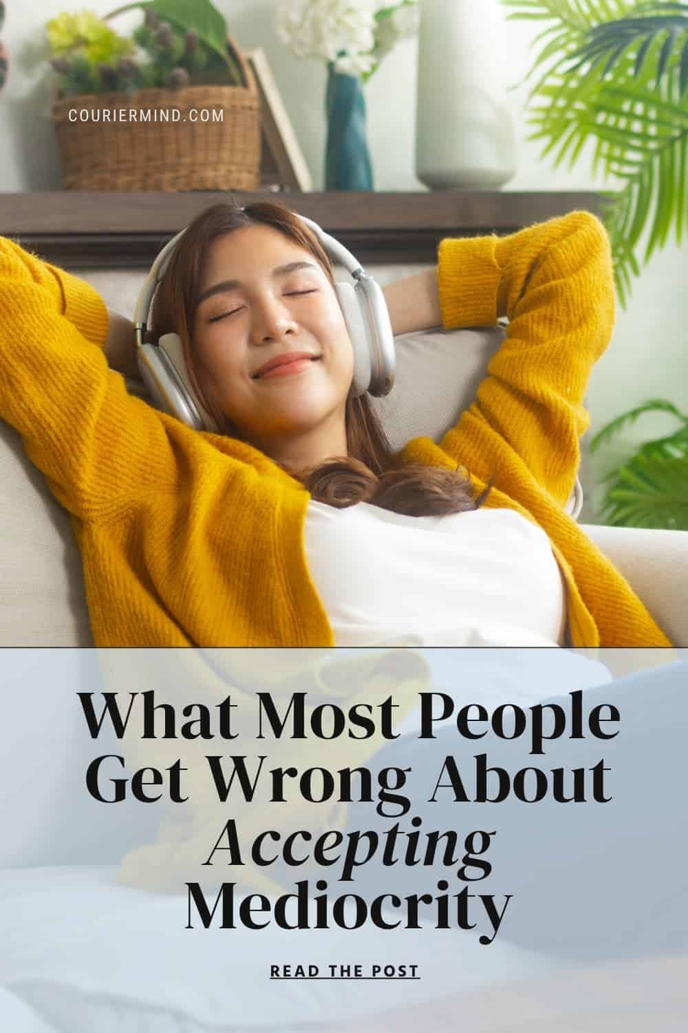 Woman wearing headphones relaxing on a couch with her eyes closed.