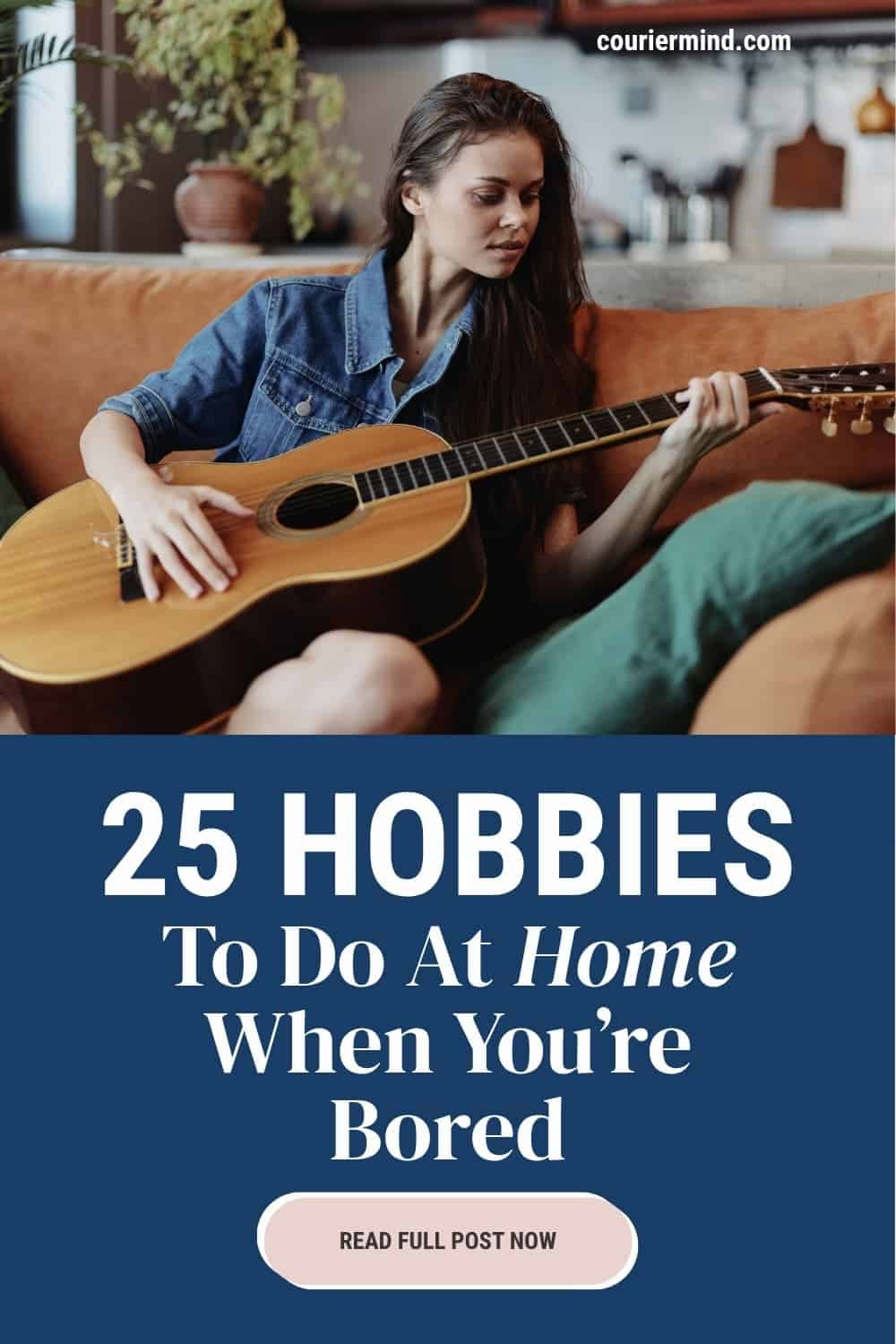 Woman with dark hair relaxing on a couch while playing an acoustic guitar in her living room.